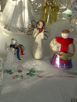 various small agnels on white table